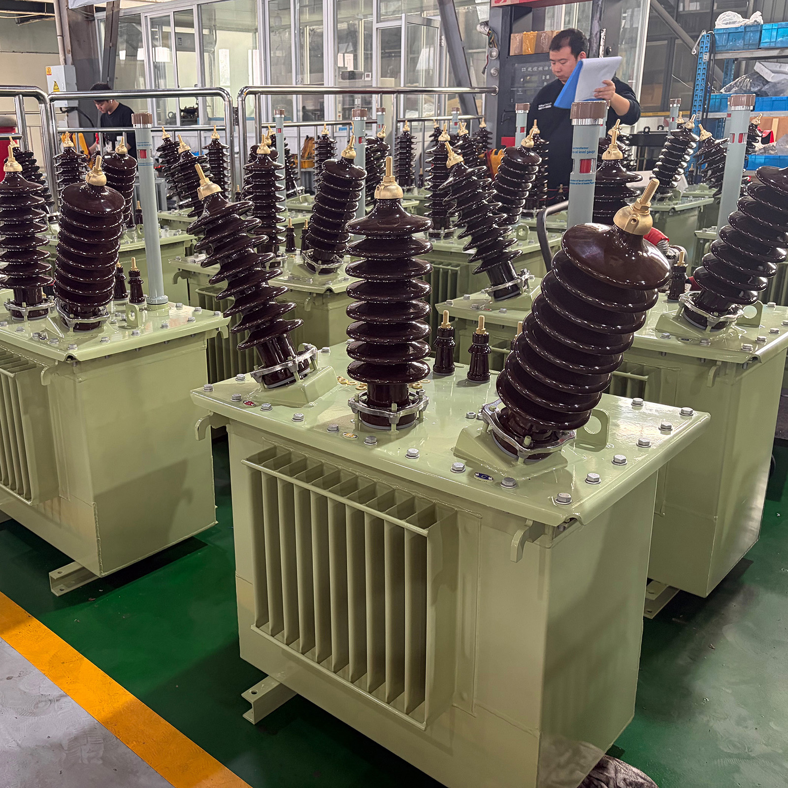 Distribution transformers on a production floor